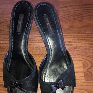 Kitten heels Louis Vuitton sandals.